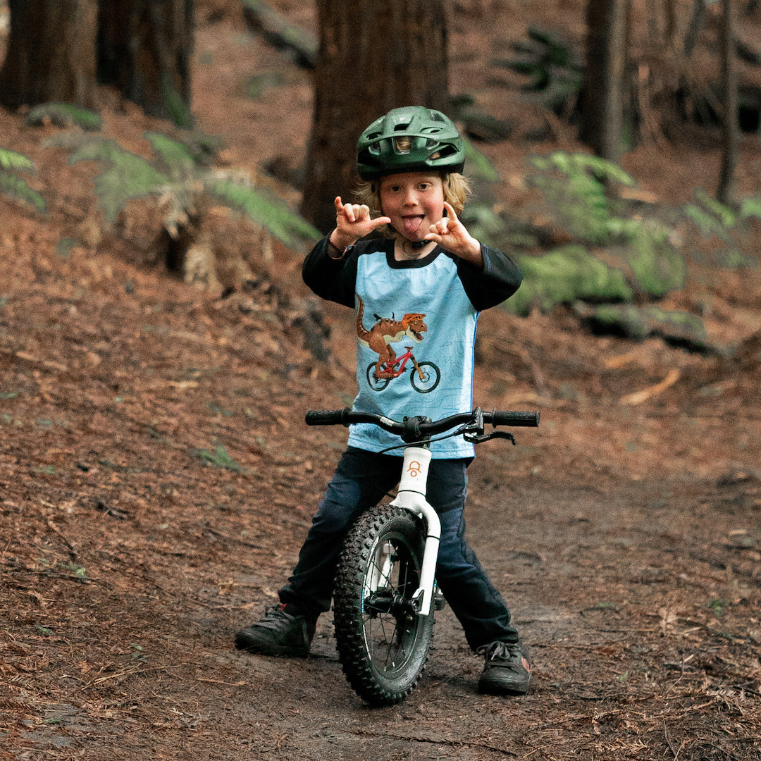 Child on balance on sale bike